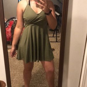 Super cute olive green dress with wrap detail!